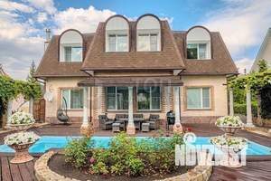 Коттедж 333м², 2-этажный, участок 15 сот.  