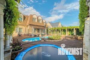 Коттедж 333м², 2-этажный, участок 15 сот.  